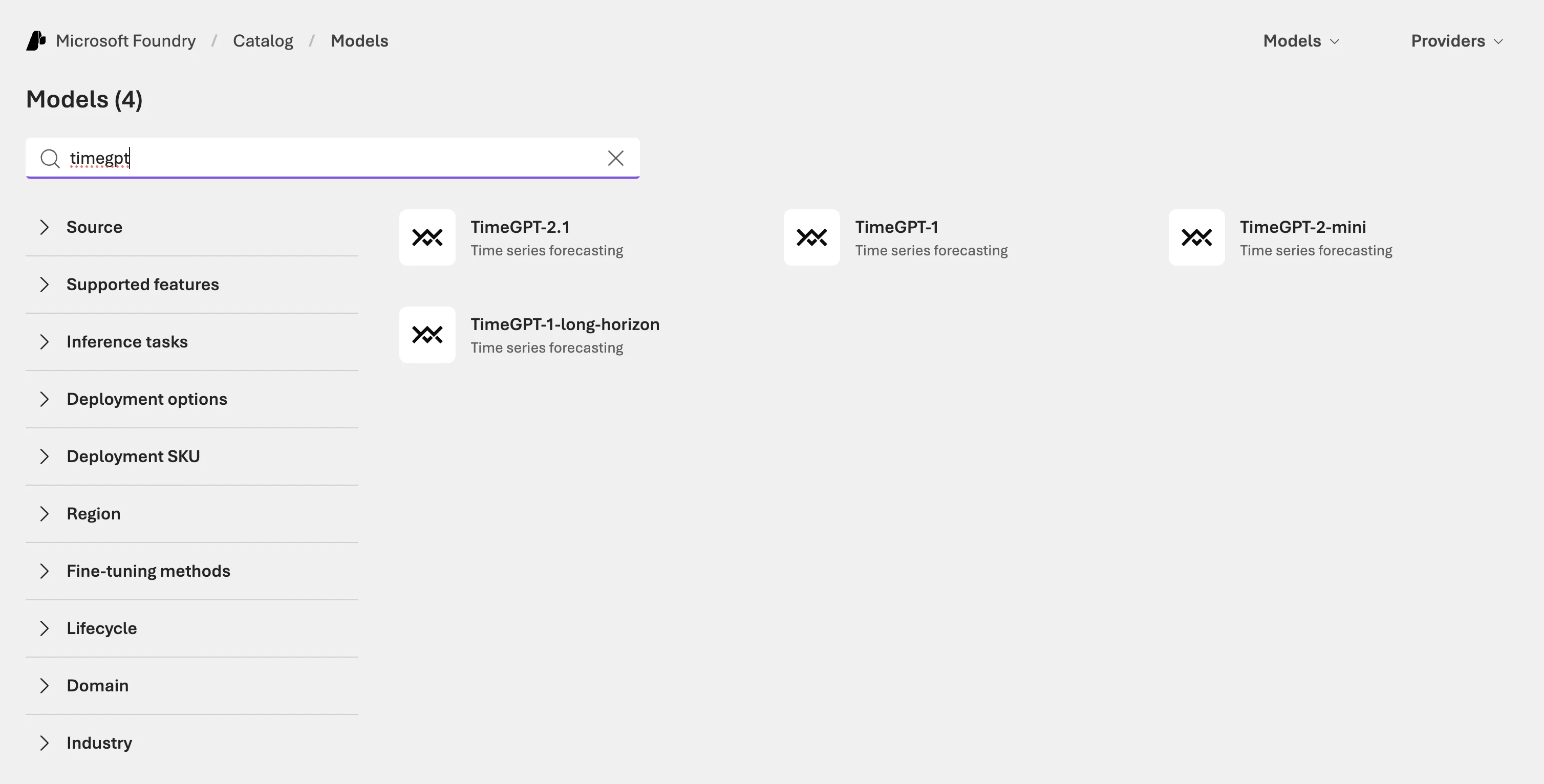 Searching "timegpt" in the Microsoft Foundry model catalog returns four TimeGPT model listings